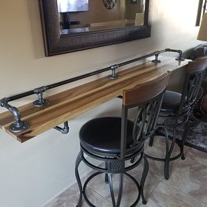 Wall-hung bar on industrial bracket in plumbing pipe design - MC Fact