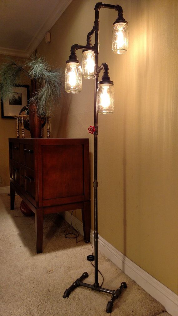 Industrial lamp on stand made of plumbing pipes and jars - MC Fact
