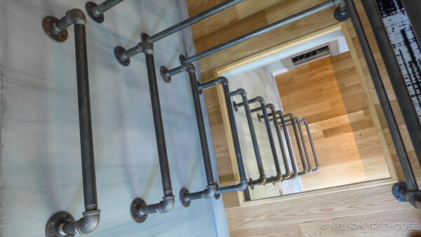 Antonio Brown cabin industrial staircase plumbing pipes Nelson TreeHouse