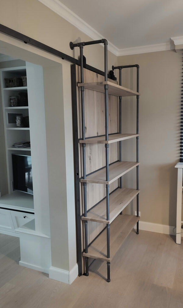 Industrial style plumbing pipe shelving unit with integrated sliding door