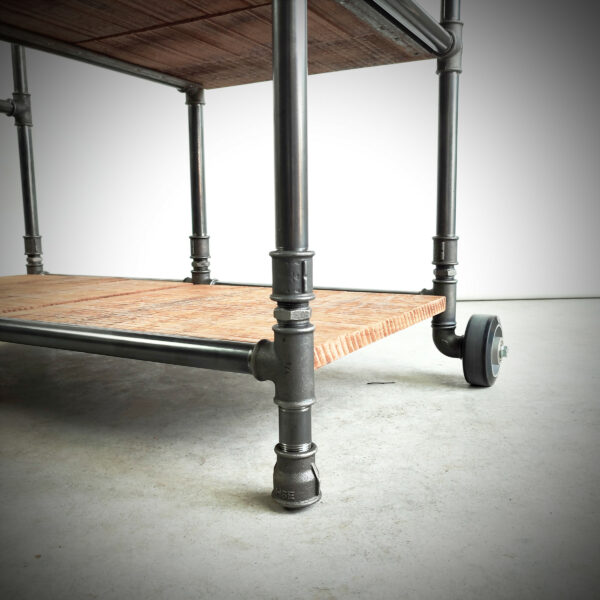 Industrial wheel on concept tube serving table - MC Fact